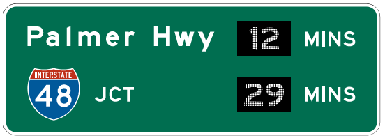 File:Figure 903.5.47 Example of a Post-Interchange Travel Time Sign.png