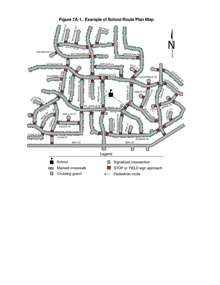 A map shows roads and pedestrian routes from every street in a neighborhood to the neighborhood school. The routes and roads include stop signs, yield signs, and crosswalks at many of the intersections.