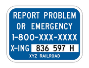 I13-1 is shown as a horizontal rectangular blue sign with a white border. It shows the message “REPORT PROBLEM OR EMERGENCY 1-800-XXX-XXXX” in white on the first three lines. “X-ING” in white to the left of “836 597 H” in black on a vertical horizontal white panel on the fourth line. “XYZ RAILROAD” in small white letters on the fifth line.